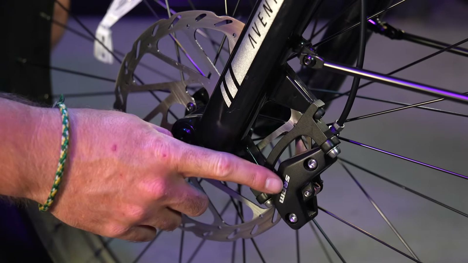 Close-up of the SRAM four-piston brake caliper