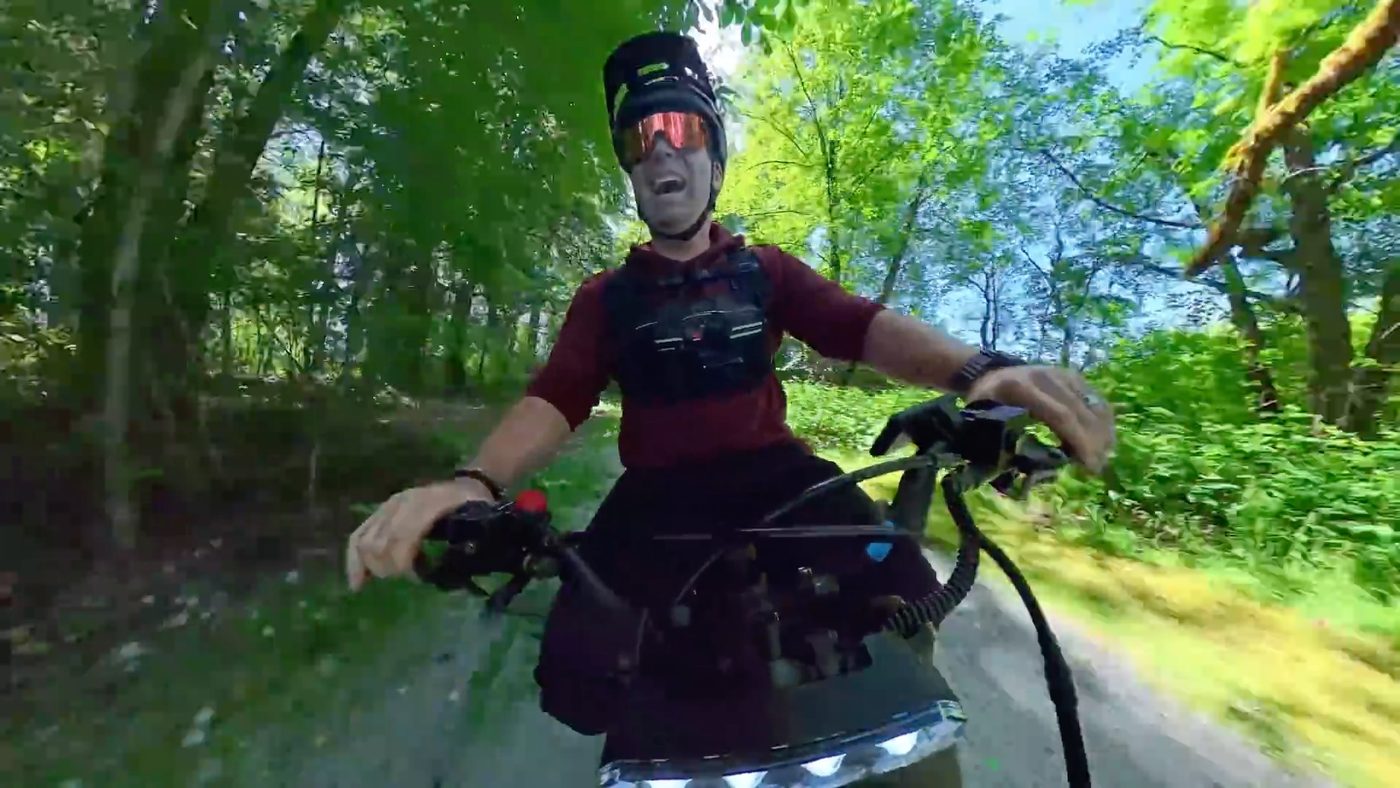 Riding the Heybike Villain on a shaded cottonwood trail