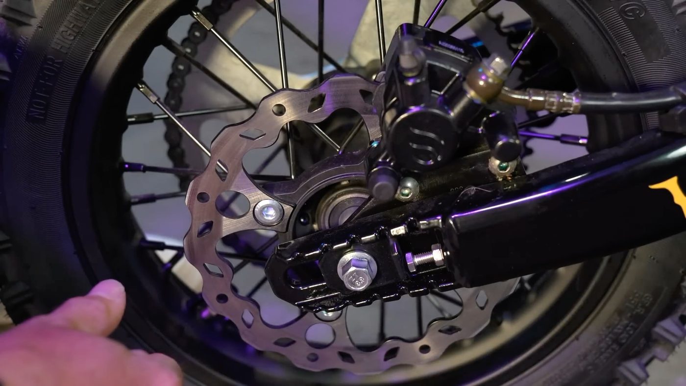 Rear floating brake caliper and thick rotor