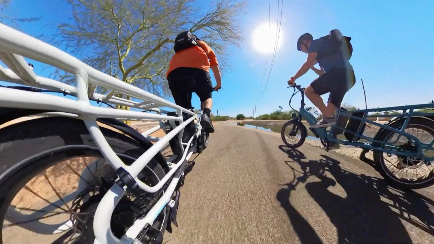 Riding the XPedition 2.0 alongside the Raindrop Blue bike