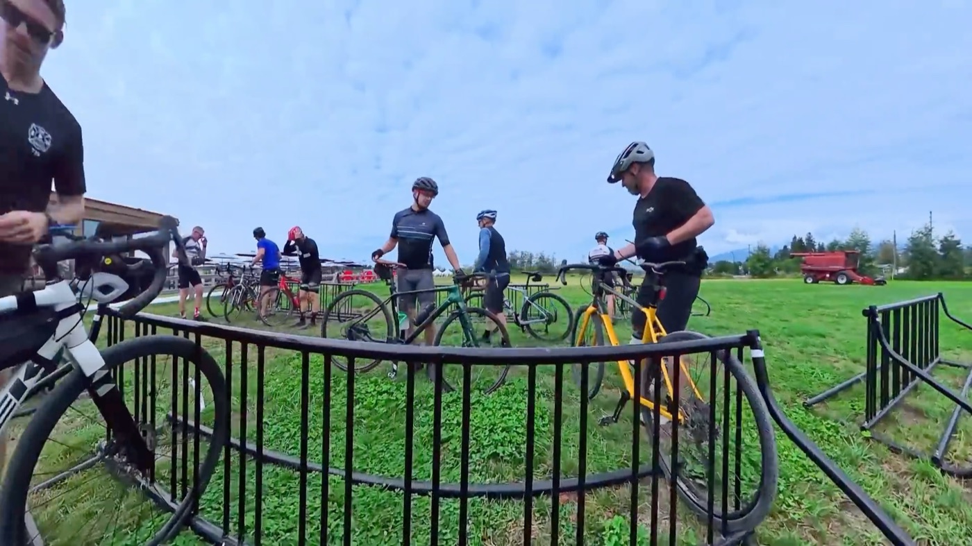 Bikes leaning on a rail at the group ride lunch stop