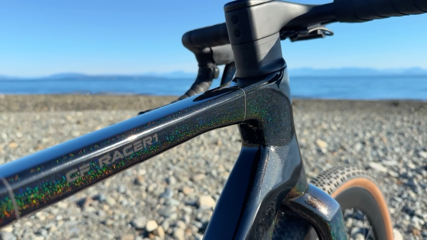 Rainbow flake paint on the CF Racer1 top tube