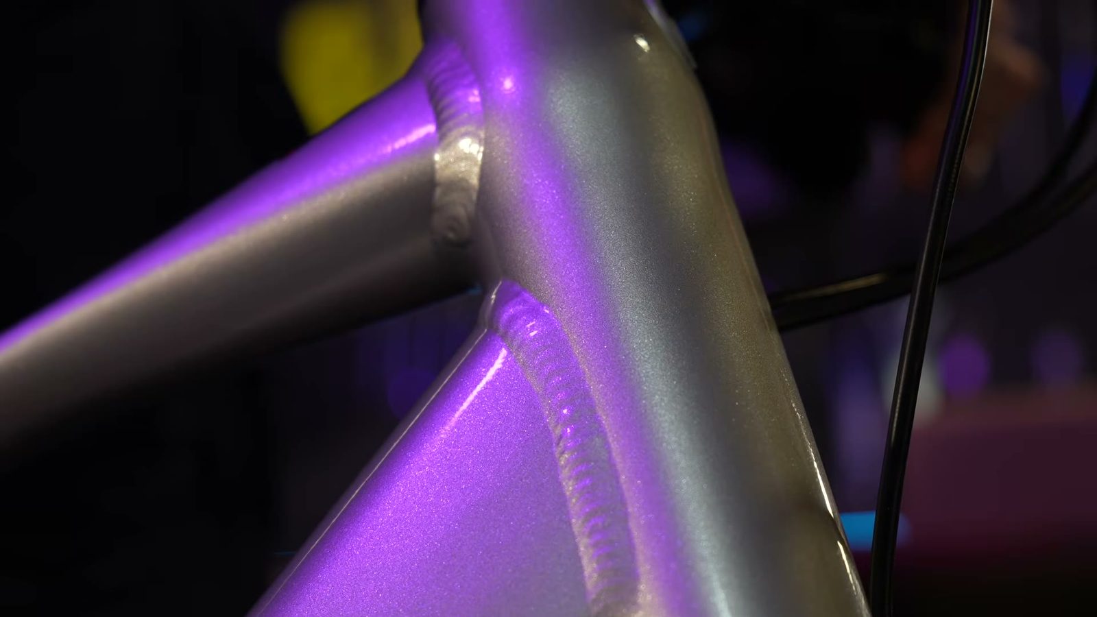Extreme close-up of the immaculate frame welds on the Tempo downtube