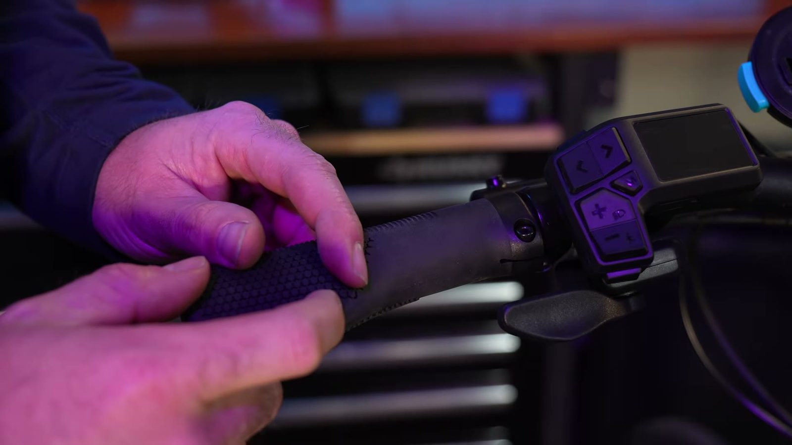 Close-up of the Tempo grip and handlebar control pad in the shop