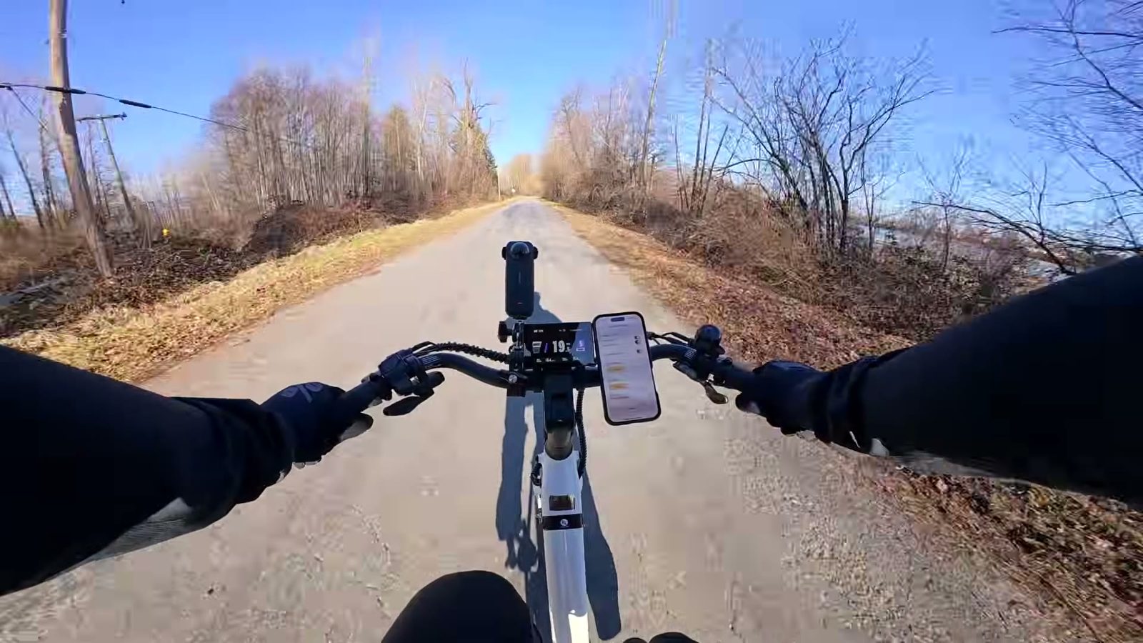 Rider point of view over the Breeze 1 cockpit rolling down a rough country road