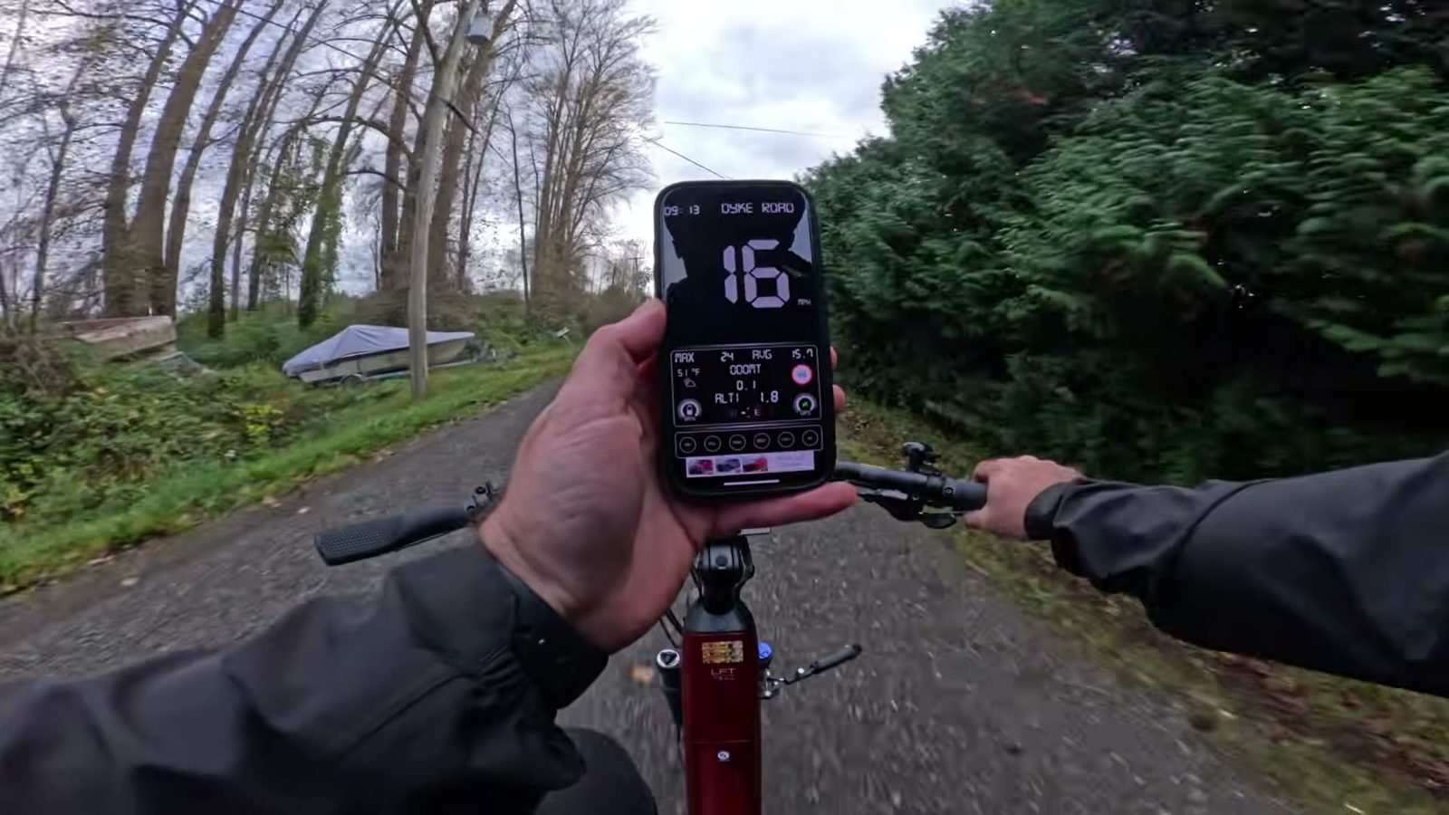 Phone GPS speedometer held next to the Discover 2 display
