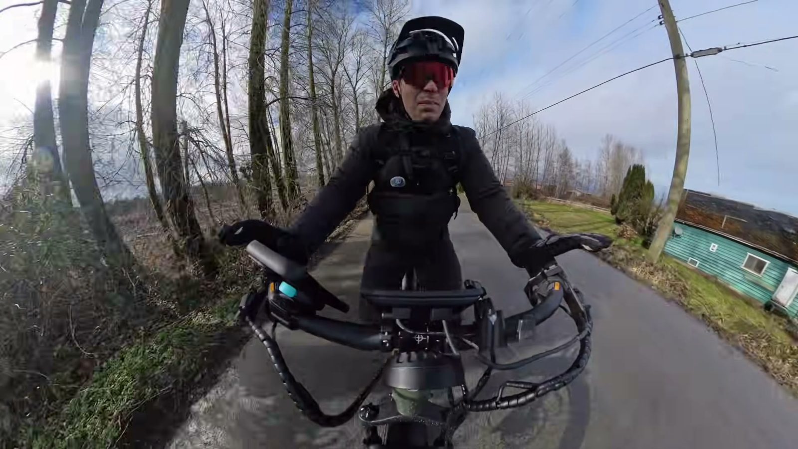 Ben pedaling the Nomad 2 with the motor off on a country road