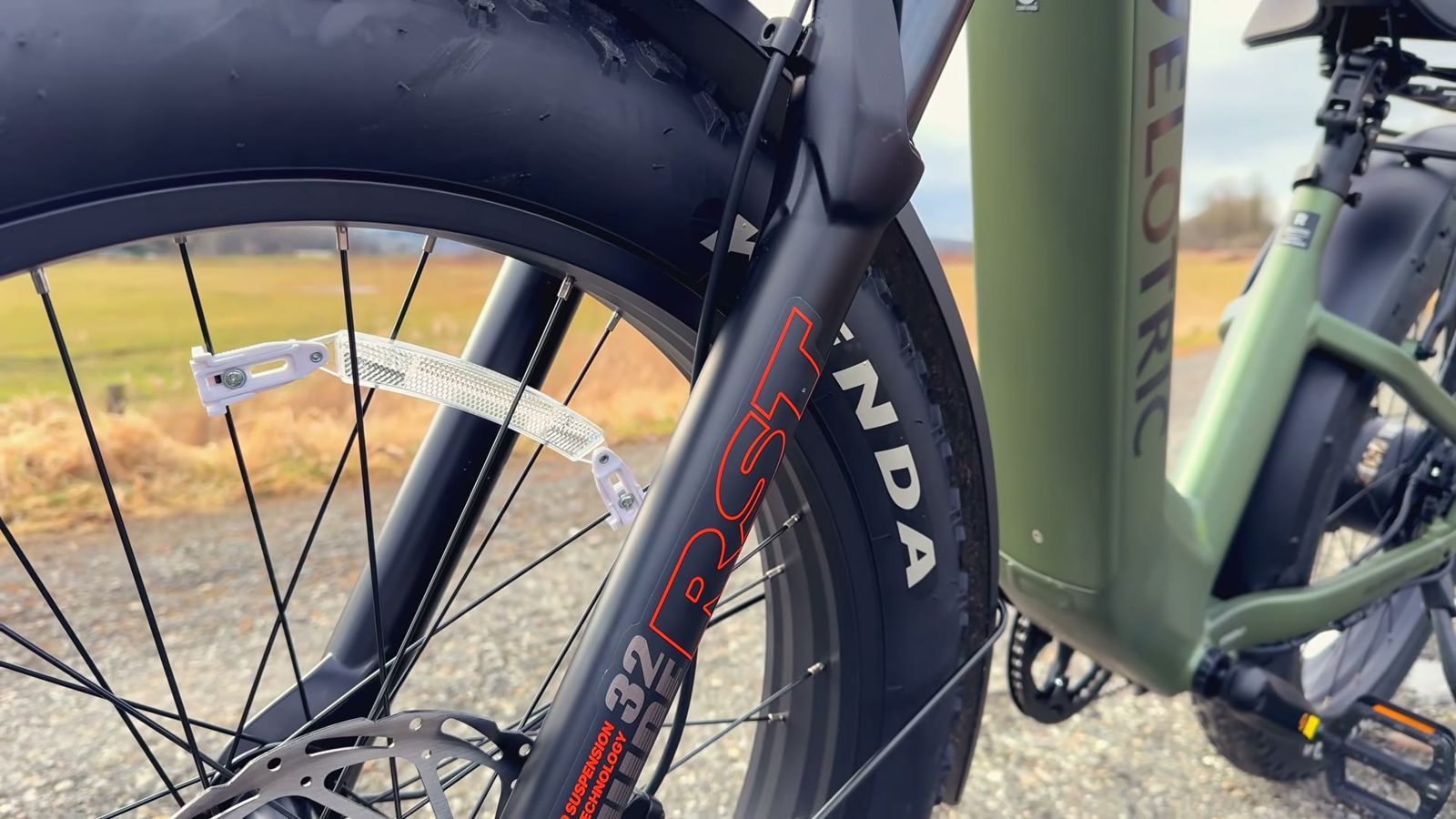Close-up of the RST suspension fork and Kenda fat tire