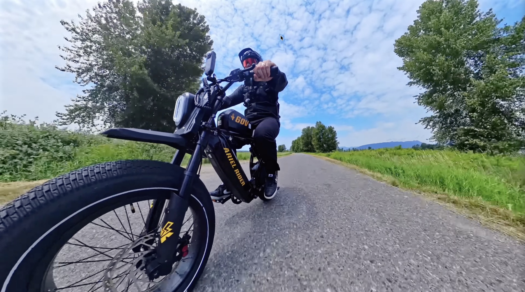 X-Class 60V rider on the road